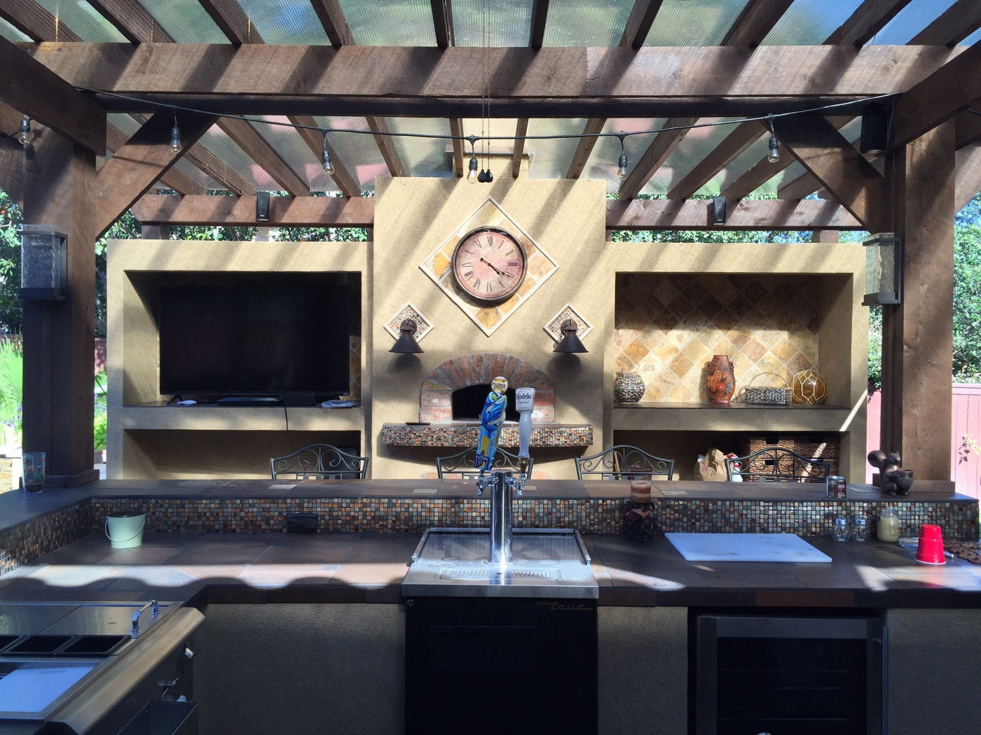 Step Up from Grill Master to Outdoor Chef With an Outdoor Kitchen